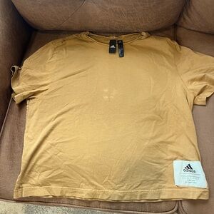 Adidas orange Tee shirt
Size M